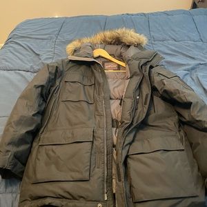 Black Eddie Bauer winter coat with fur hood. Size Large. Extremely warm.